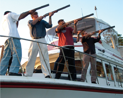 4 men on boat